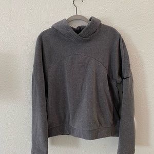 Grey Nike sweater.